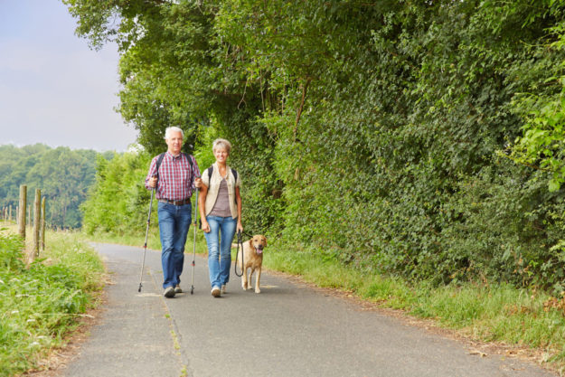 Couple Walking on Trail Staying active can help manage high blood pressure
